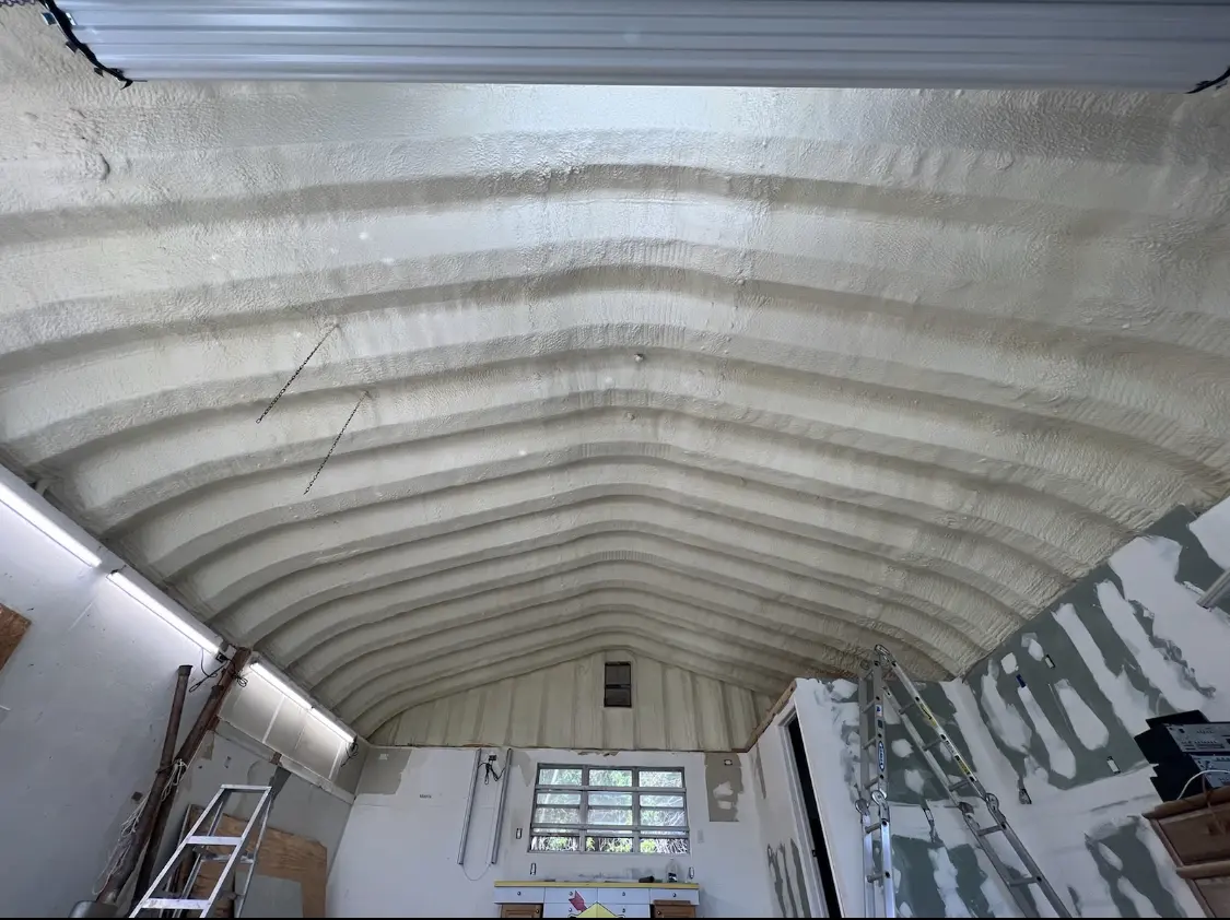 Spray polyurethane foam applied to the underside of a metal roof deck in West Chicago